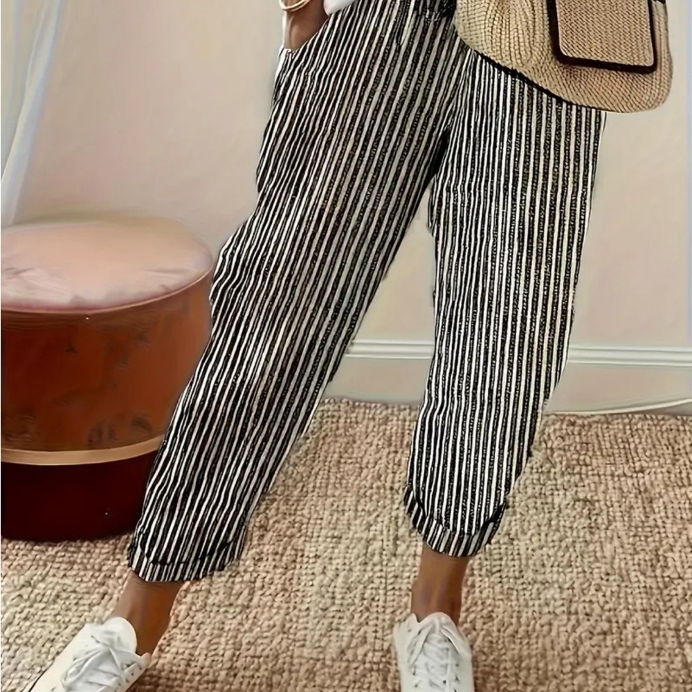 Gray/White Pinstripe pull onNice fit. Can foldup. Large left.Polyester Very Cute